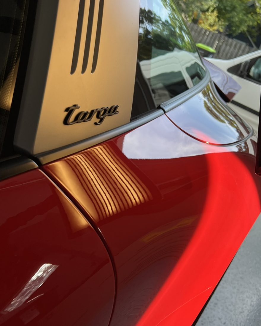 After: the stripes curve smoothly over the fender