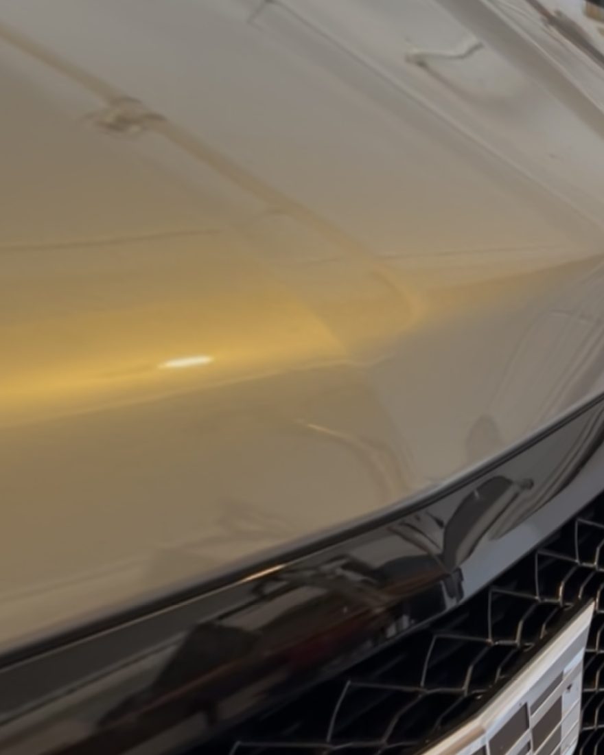 After: the Escalade hood is smooth again