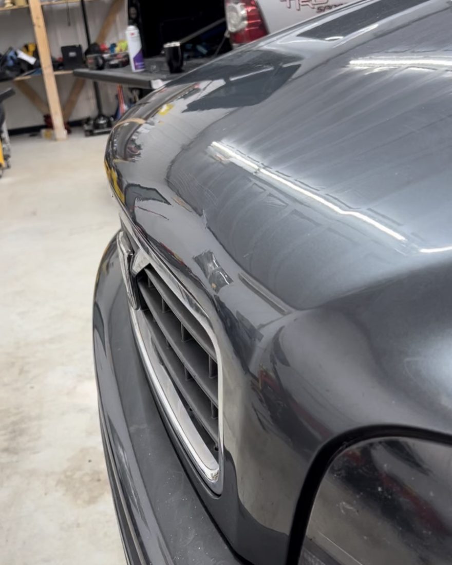 After: the Volvo fender looks straight again